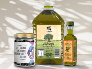 a big plastic jug of olive oil, a smaller glass bottle or olive oil and a jar of black olives. All three have their labels printed